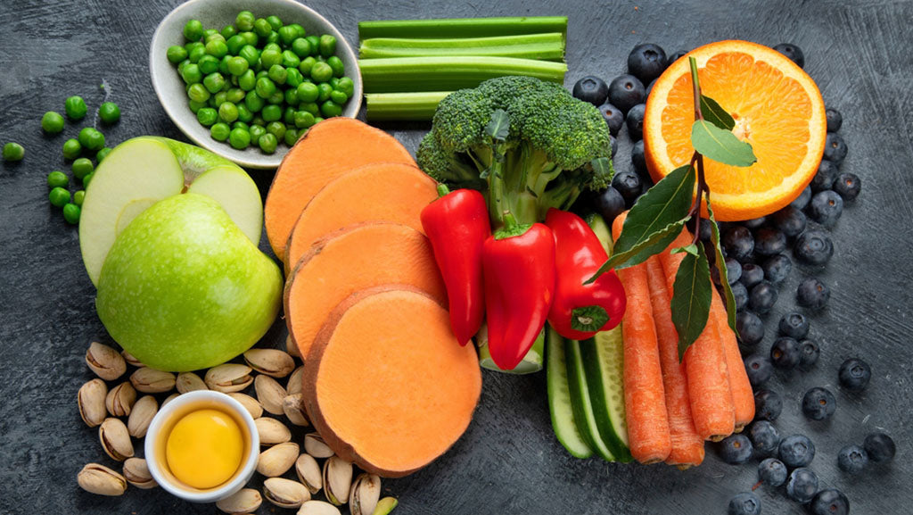 foods high in lutein on dark background