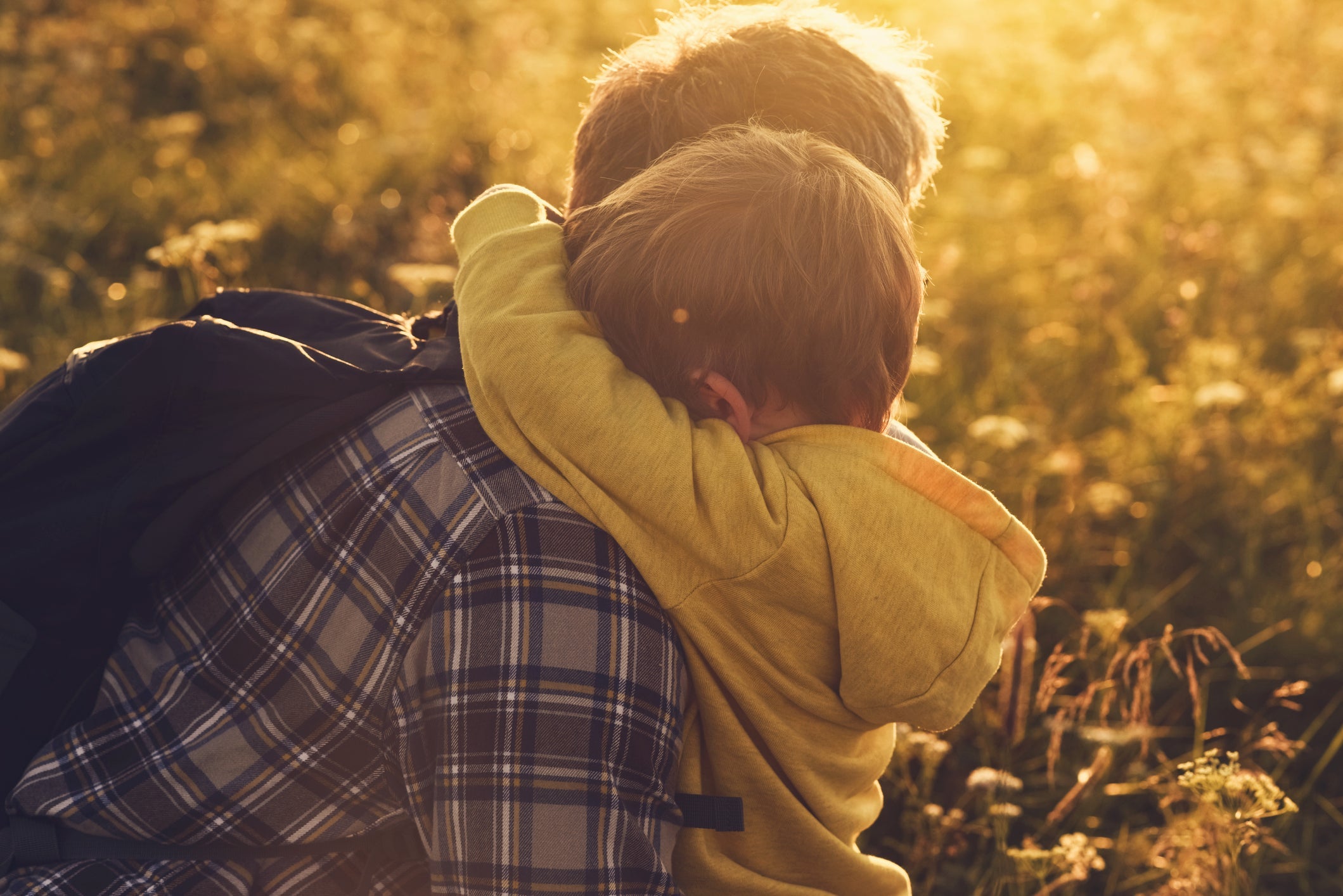 Little boy hugging his dad