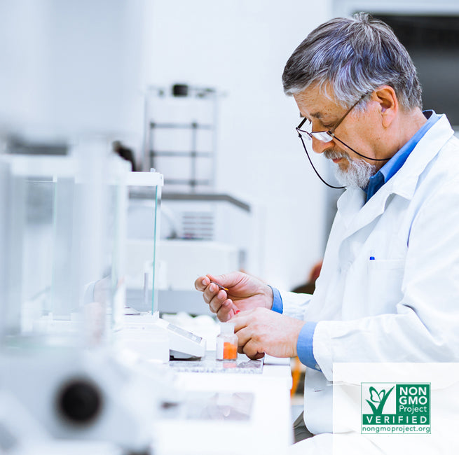 a scientist works with ingredients in a lab