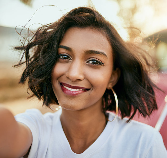 Woman smiling media carousel view 7