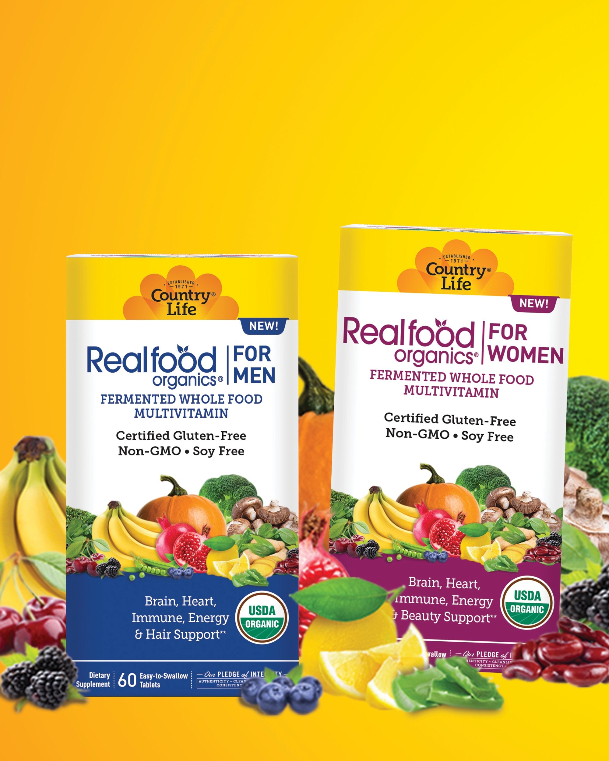 A man wearing a white t-shirt holds a Realfood Organics tub while standing in front of a yellow background