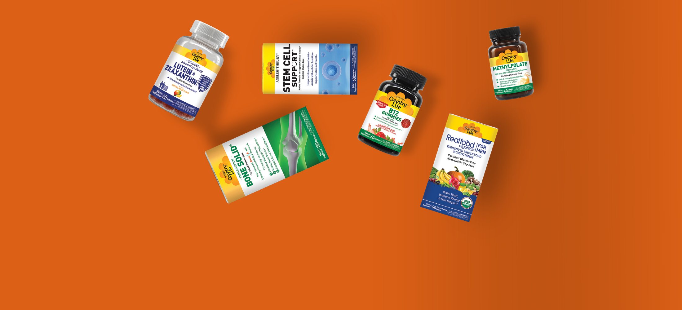A collection of daily health supplements on an orange background