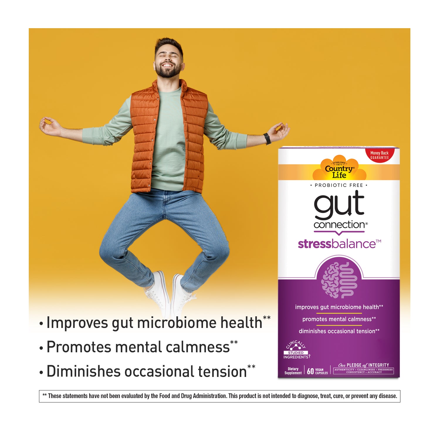 Man jumping joyfully with Country Life Gut Connection Stress Balance supplement packaging on a yellow background media carousel view 6