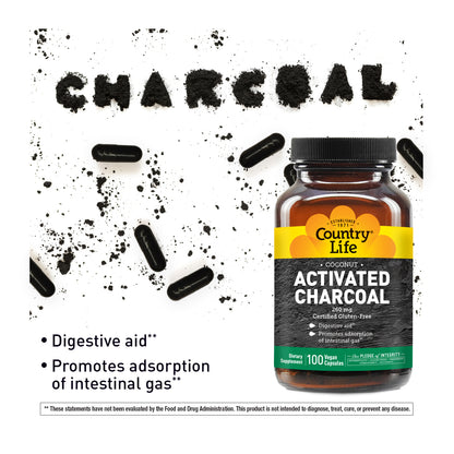 Bottle of Country Life Activated Charcoal with text about its uses on a white background.