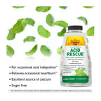 Bottle of Country Life Acid Rescue supplement with mint leaves on a white background