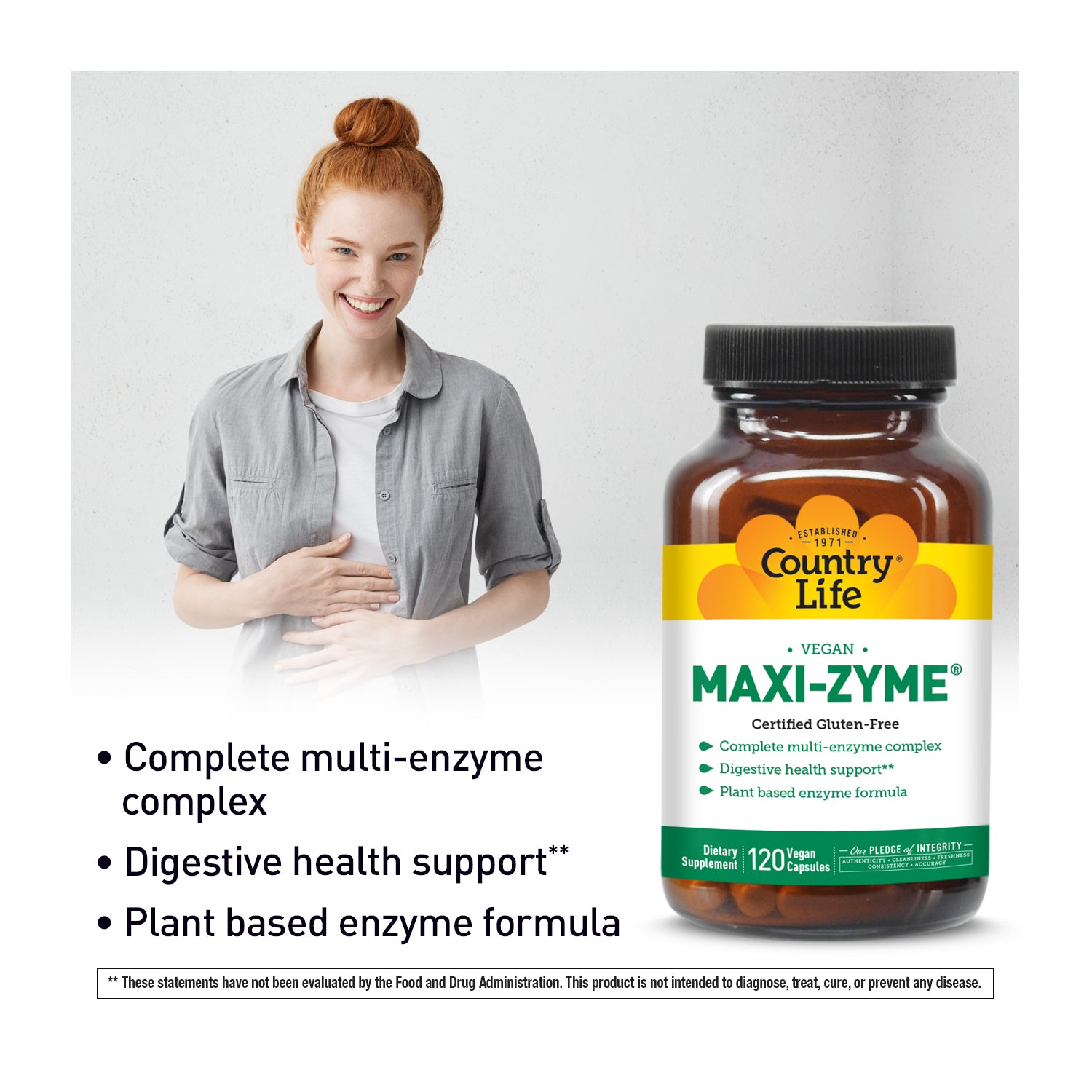 Person with a bottle of Country Life Maxi-Zyme supplement on a white background