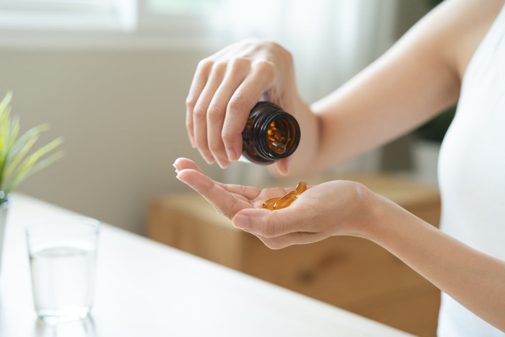 supplements in hand